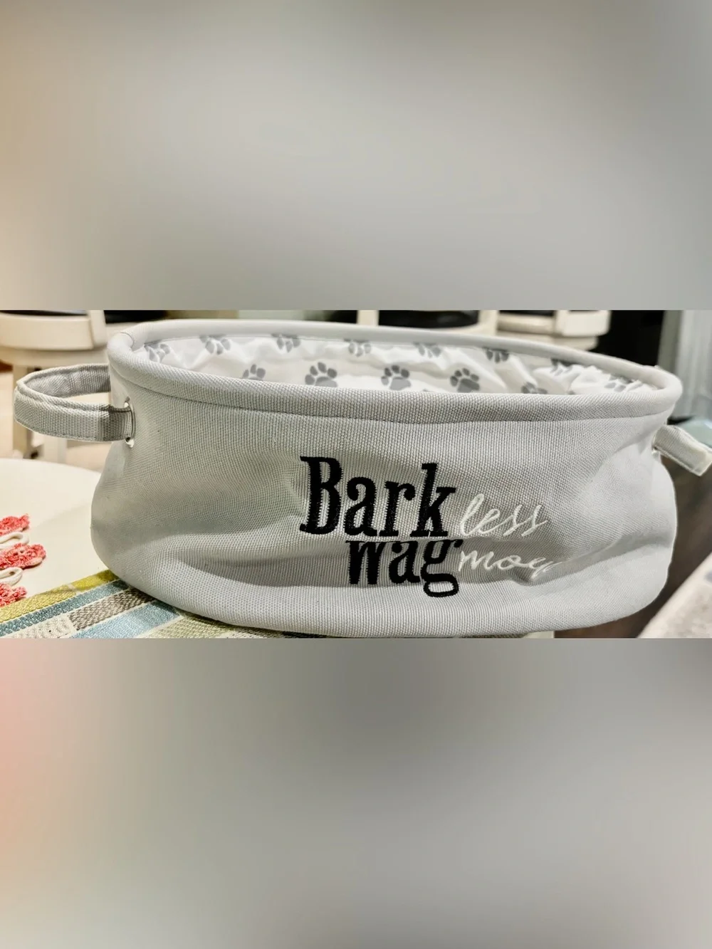 Bark Less Wag More” Embroidered Canvas Pet Toy Basket in Light Gray/Paw Prints